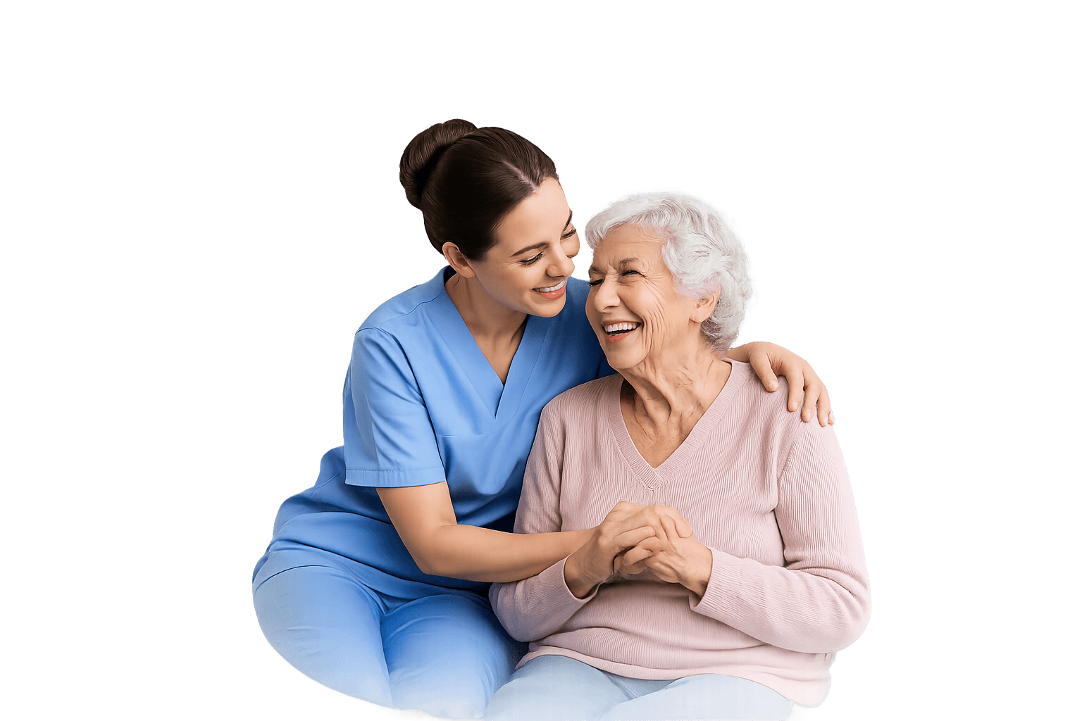 Caring caregiver smiling with an elderly woman at home — Blessed Hearts Homecare
